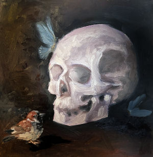 a human skull with a sparrow nearby