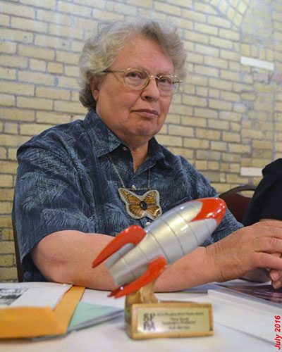 Ruth Berman with Rhysling trophy